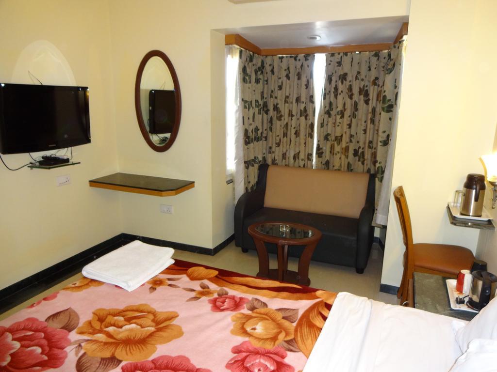 Hotel Nahar Manchester Inn Coimbatore Rum bild